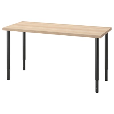 A rectangular wooden desk on black adjustable metal legs. Simple, modern design.