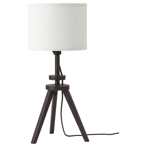 Lamp: LAUTERS, dark wood tripod base, white shade, mood lighting.