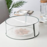 Mesh food cover protects plates. Limits fly access, easy to fold.
