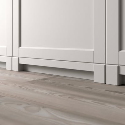 Decorative kitchen plinth with beveled edges fits LERHYTTAN cabinets, enhancing rustic look.