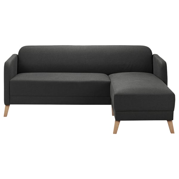 Modern dark gray l-shaped sofa, vissle fabric, wooden legs, clean lines.