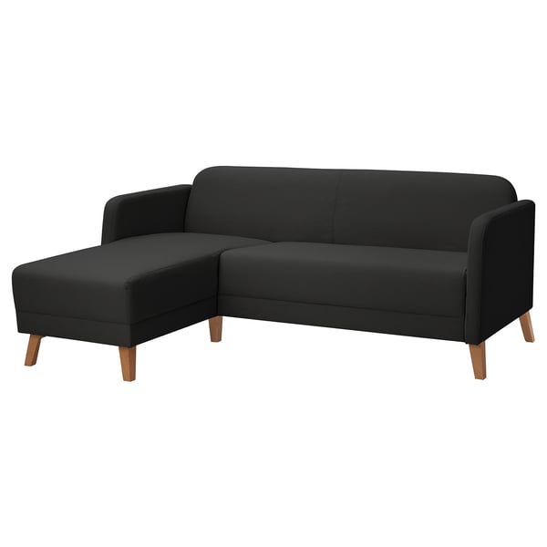 Black modern sofa, l-shaped, dark upholstered fabric, wooden legs, sleek and simple design.