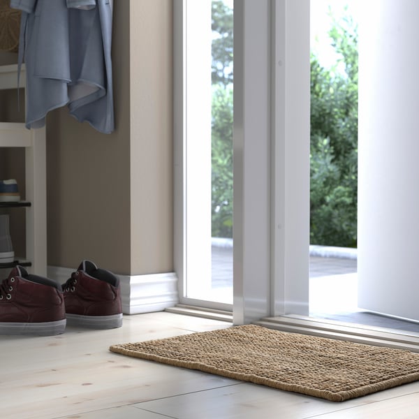 LOHALS natural jute door mat at entryway, large, rustic.