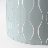 Modern lampshade with wavy design; crafted from durable polyester, polypropylene, and steel.