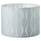 LÖKNÄS lamp shade, light gray with wavy white design. Round cylinder shape, textured fabric.