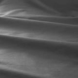 Close-up of smooth, luxurious fabric with subtle sheen, showcasing high-quality texture and fine weave.