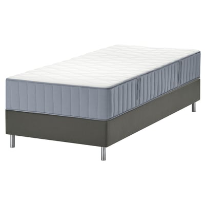 Modern bed with grey LYNGÖR mattress, featuring 7 comfort zones on a grey base.