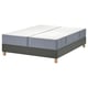 Gray LYNGÖR bed base with split mattress on wooden legs.
