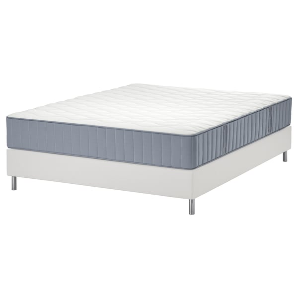 White LYNGÖR bed with gray mattress, featuring 7 comfort zones and pocket springs.
