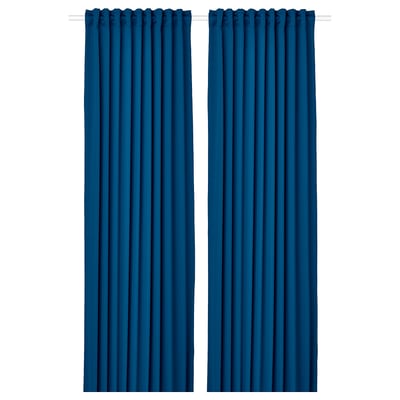 Two dark blue MAJGULL block-out curtains hang straight, featuring a smooth texture and simple design, ideal for privacy and light control.
