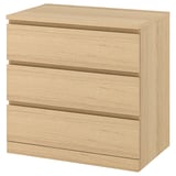 A MALM chest of drawers in oak veneer with three smooth-running drawers.