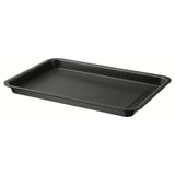 A black rectangular MÅNTAGG baking tin, made of non-stick coated galvanized steel, with smooth edges and a plain design.