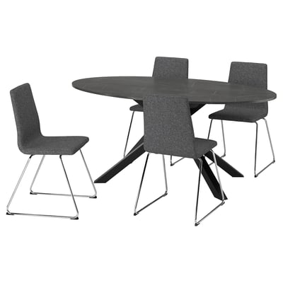 A modern, oval black dining table with three matching upholstered gray chairs, featuring a sleek sled base design.