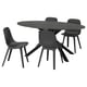 Black circular dining set with modern chairs, marble table, and sleek design