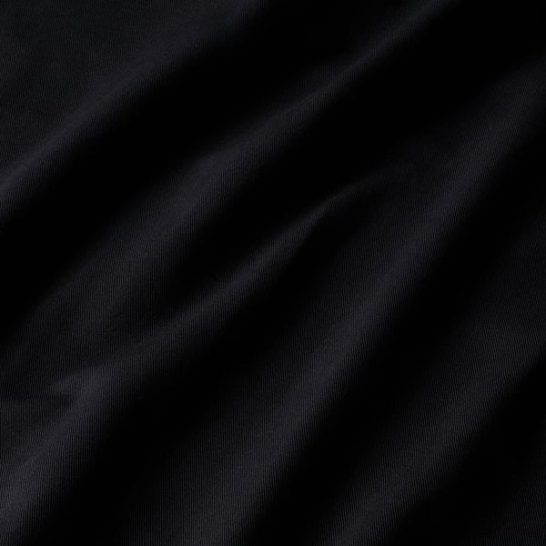 Dark, thick, textured curtains. Horizontal lines visible, suggesting high-quality fabric.