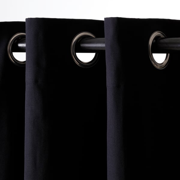 Black curtains with eyelet heading for easy hanging. Darkens room, provides privacy, regulates temperature.