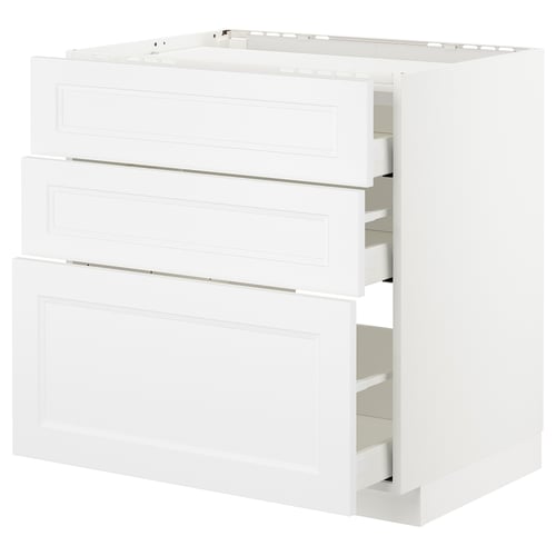White kitchen cabinet, three open drawers, modern minimal design, made of fibreboard and steel.