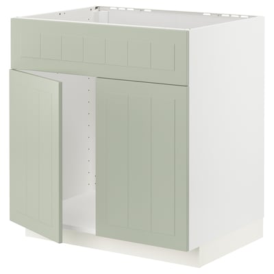 A light green METOD kitchen cabinet with a classic design, featuring two doors and a sturdy frame, perfect for a harmonious kitchen look.