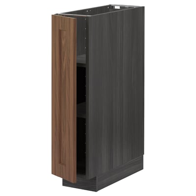 A dark wooden kitchen cabinet, part of the METOD system, featuring walnut-look foils and a modern design.