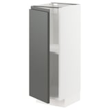 Modern dark grey ikea METOD kitchen cabinet with white interior and adjustable shelves.