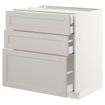 White METOD kitchen cabinet with three drawers, classic design with bevelled edges.