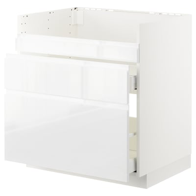 White glossy METOD kitchen unit with smooth drawer, modern design.