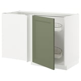 Open green kitchen cabinet, white frame, two shelves.
