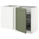 Modern kitchen unit with green door, white body, statement design, ideal storage, pull-out carousel.