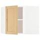 This image shows a light brown wooden cabinet door attached to a white cabinet frame.