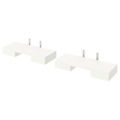 Three white modular kitchen shelves, two single and one double, mounted on wall brackets.