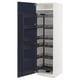 Shows white METOD kitchen cabinet with blue pull-out shelves, styled modern.