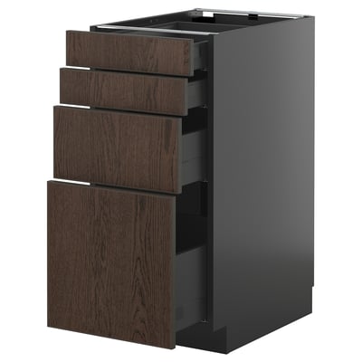 Modern kitchen unit with dark brown wooden drawers and sleek black frame, featuring six drawers in a tall, vertical layout.