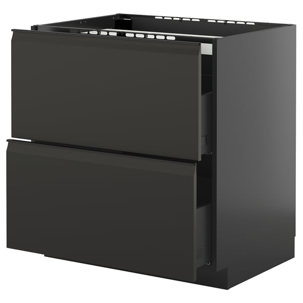 Modern black kitchen drawers - METOD. Sleek, matte black, with integrated handles. Soft-close drawers, sturdy design.