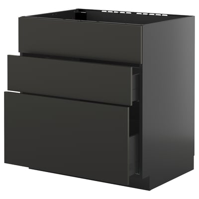Modern black kitchen unit with sleek, glossy finish and three drawers, part of METOD system.
