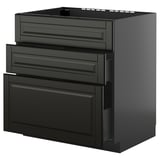 Image shows black METOD kitchen cabinet with multiple drawers. Sleek, modern design in glossy black.