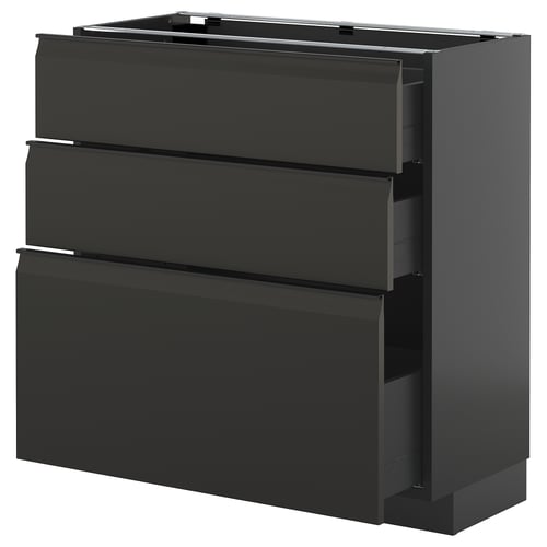 Modern black ikea METOD kitchen cabinet with three integrated handle drawers.