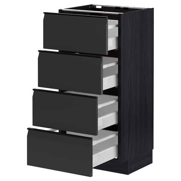 Modern kitchen cabinet METOD with upplöv black drawers, four partially open on dark frame, sleek design.