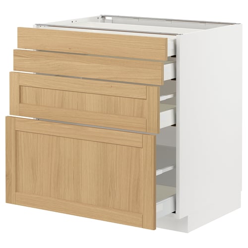 Modern kitchen cabinet with three light oak-veneer drawers and white frame.