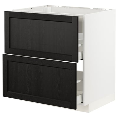 White ikea METOD kitchen cabinet with dark stained wooden drawers.