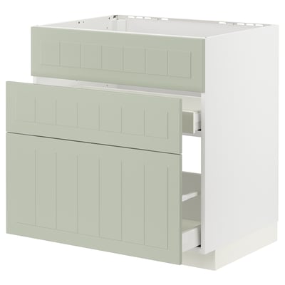 White and green ikea METOD kitchen units with drawers and cabinet.