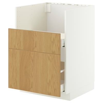 A white and light wooden kitchen cabinet with drawers.