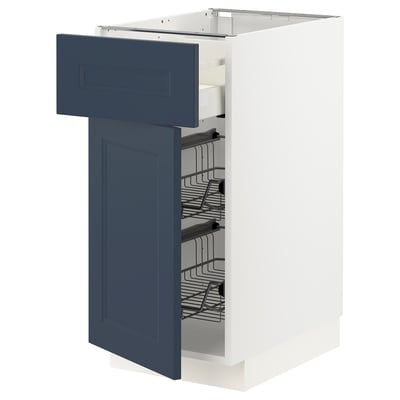 A blue kitchen drawer unit from the METOD system. It a sleek, modern design with a frame, multiple wire baskets, and a self-closing drawer.