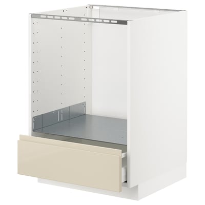 White METOD kitchen cabinet with beige drawer, modern design.