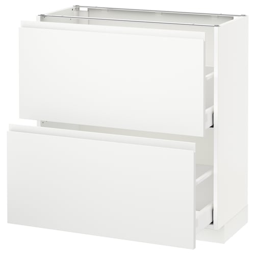 A white ikea METOD kitchen cabinet with smooth surfaces and integrated handles.
