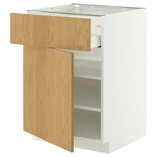 A white IKEA METOD kitchen cabinet with an oak drawer and door, featuring adjustable shelves.