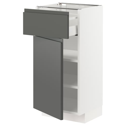 A modern METOD kitchen cabinet in white with dark grey drawers, offering a sleek and contemporary design.