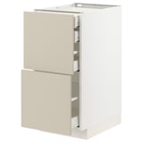 Modern kitchen cabinet with beige drawers and white body, featuring sleek lines and self-closing drawers.