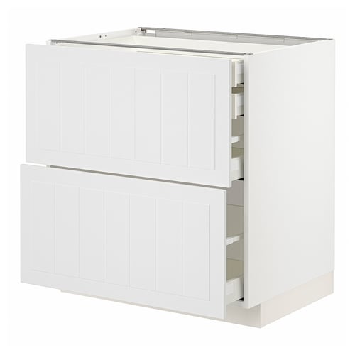 White METOD kitchen cabinet with multiple shelves and drawers.