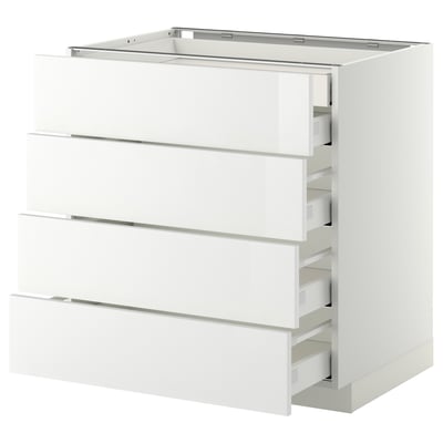 Ikea METOD white high-gloss kitchen unit. Modern, rectangular, multi-drawer design with sleek, white finish.
