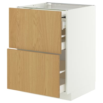 A white METOD kitchen cabinet with wooden drawers, featuring a modern design with smooth edges and a pull-out work surface.
